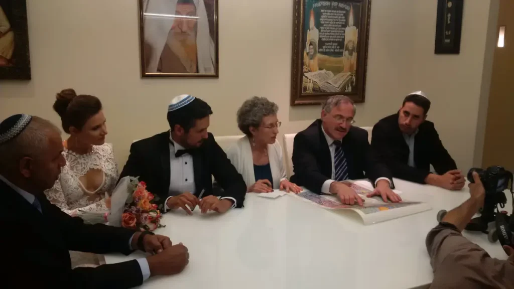 riding ketubah at signing - Peretz Rodman